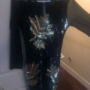 Black and gold sequin dress